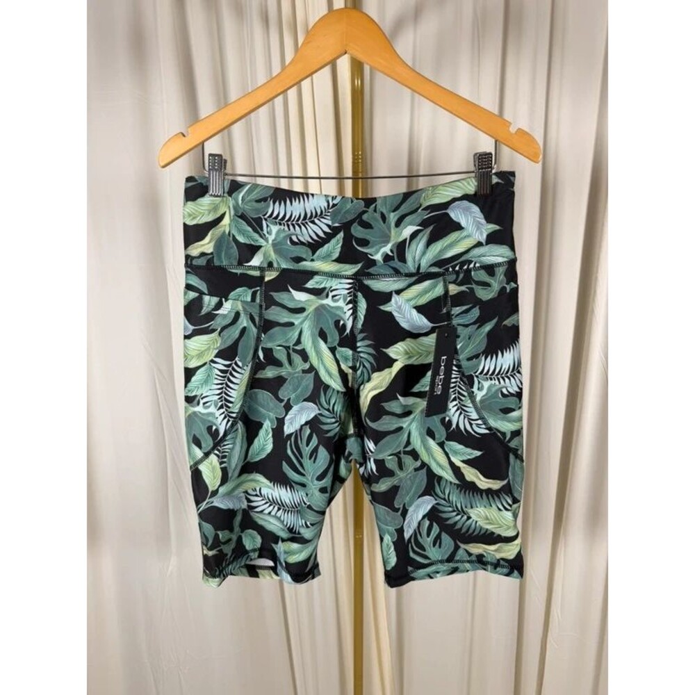 bebe SPORT High Rise Tropical Palm Monstera Leaf Print Bike Shorts Pockets